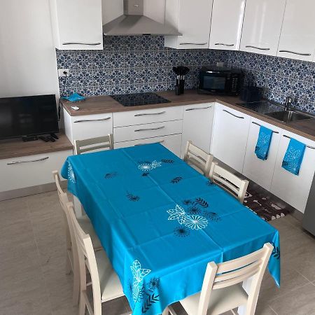 Residence Le Maree Porto Pino Bagian luar foto