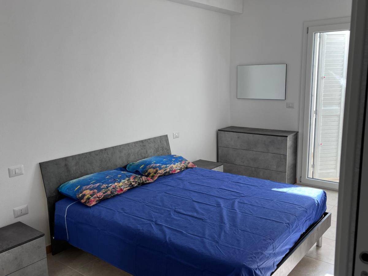 Residence Le Maree Porto Pino Bagian luar foto