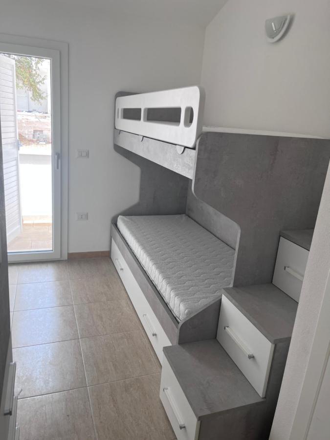 Residence Le Maree Porto Pino Bagian luar foto
