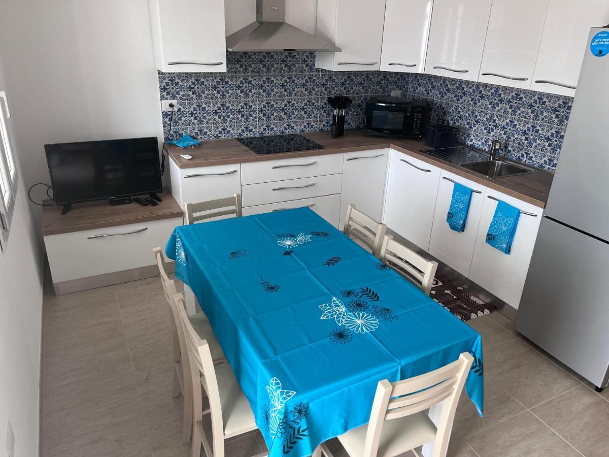 Residence Le Maree Porto Pino Bagian luar foto