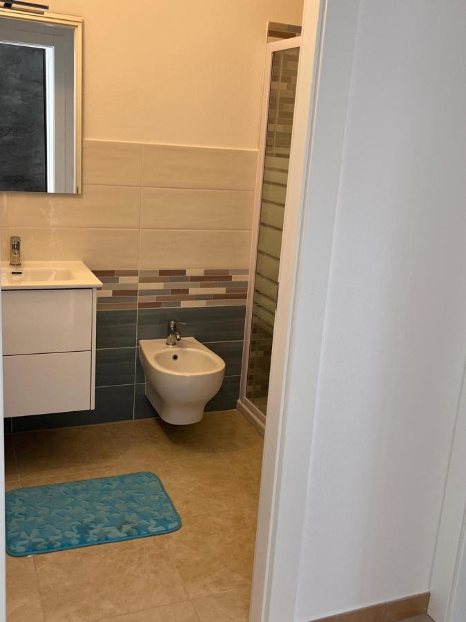 Residence Le Maree Porto Pino Bagian luar foto